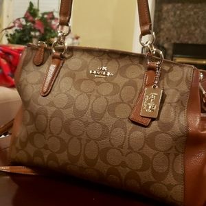 womens COACH monogram bag